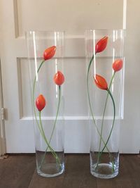 Orange in small vase